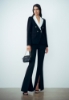 PANTALONE SVASATO CON SPACCO IN CADY