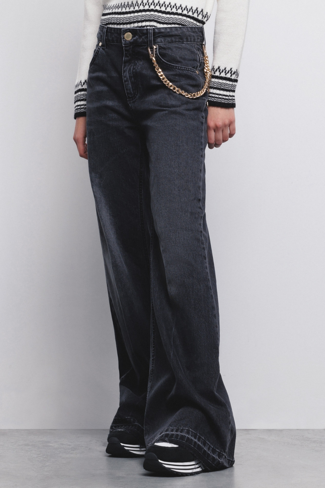 Jeans neri con catena discount