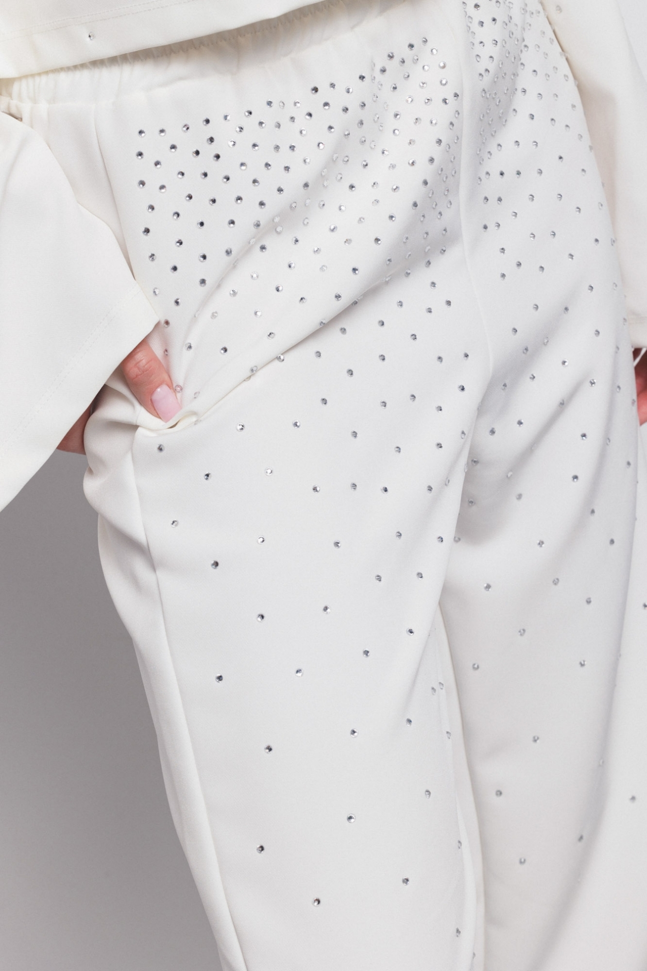 Wide leg trousers with rhinestone detail on the front Off