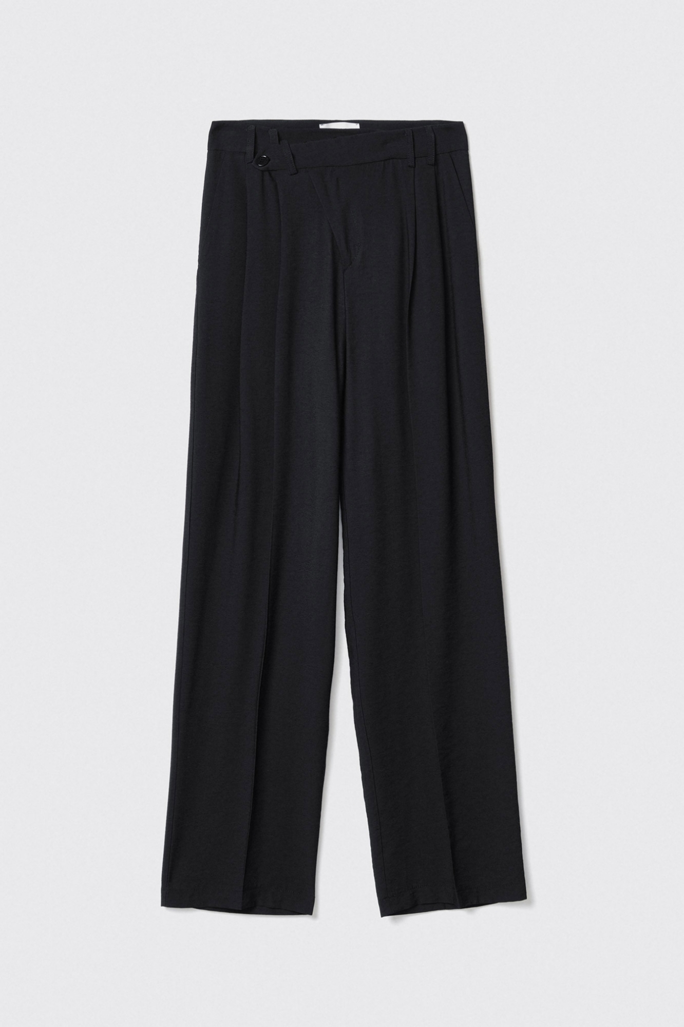 Pantalone a vita bassa in poliviscosa con cinturino in sovrapposizione pieghe e tasche alla francese • Nero