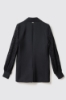Giacca in twill monopetto con maniche a sbuffo a contrasto e polisino • Nero