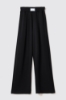 Pantalone dritto con etichetta davanti • Nero