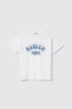 T shirt in jersey paricollo con ricamo • Bianco