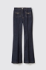 Pantalone flare slim con orlo fondo • Blu