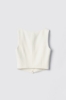 Top crop smanicato con bottoni in cady • Gesso