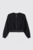 Giubbino zip con dettaglio tulle • Nero