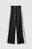 Pantalone a palazzo in twill con fianchi in raso • Nero gesso