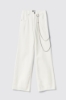 Pantalone boy over loose fit con catene strass • Off white