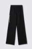 Pantalone boy over loose fit con catene strass • Nero