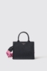 Mini shopper con logo in metallo e tracolla jacquard • Nero