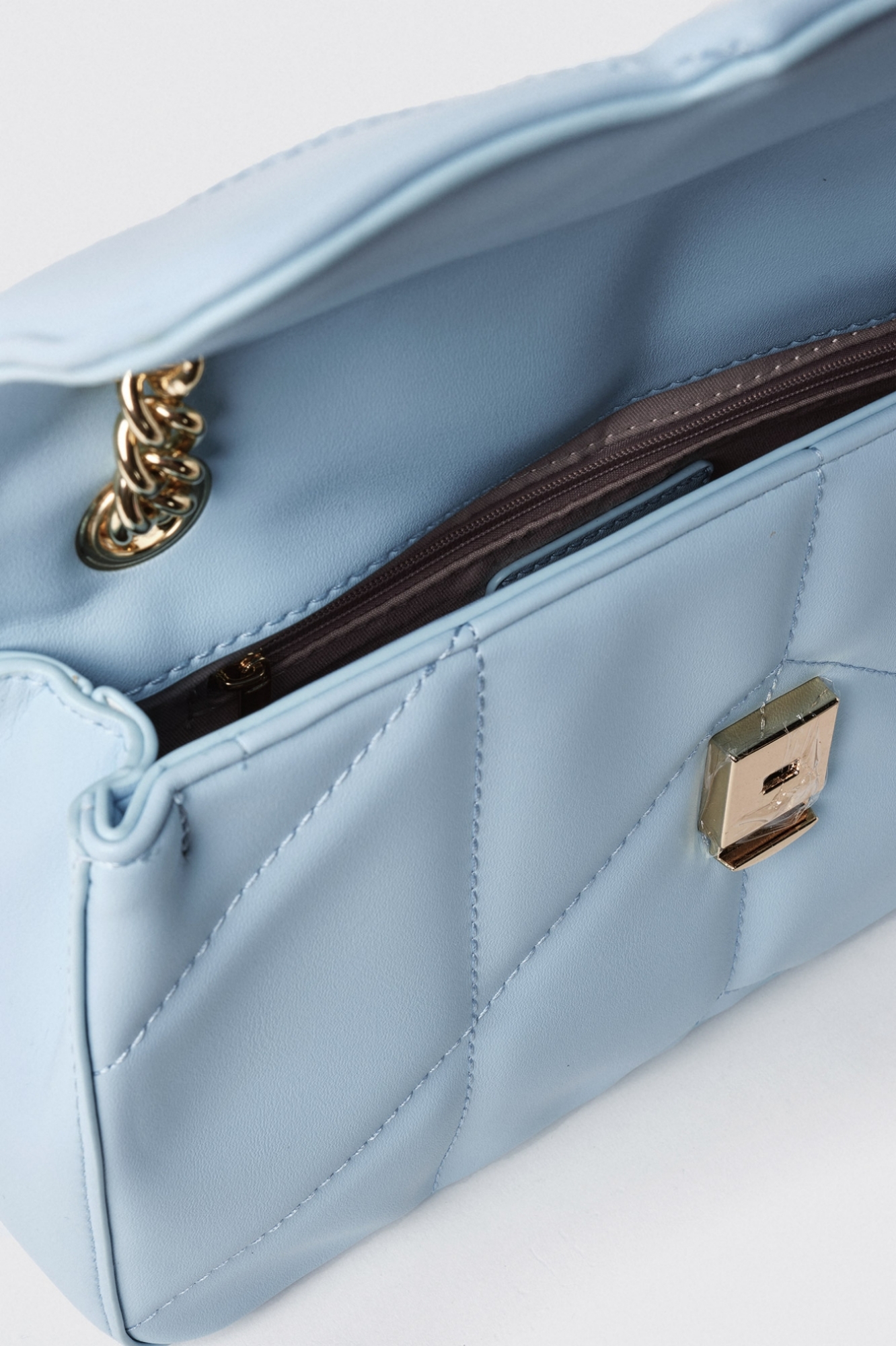 Reg shoulder strap con matelasse' e logo in metallo • Celeste