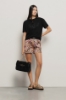 Maxi shoulder strap con matelasse' e logo in metallo • Nero