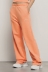 Pantalone palazzo in felpa con tasche alla francese e stampa • Arancione melone