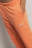 Pantalone palazzo in felpa con tasche alla francese e stampa • Arancione melone