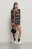 Cardigan con logo • Nero-arancione