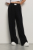 Pantalone dritto con etichetta davanti • Nero