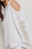 Felpa girocollo con interventi in macramè • Bianco