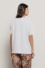 T shirt jersey paricollo con stampa • Bianco