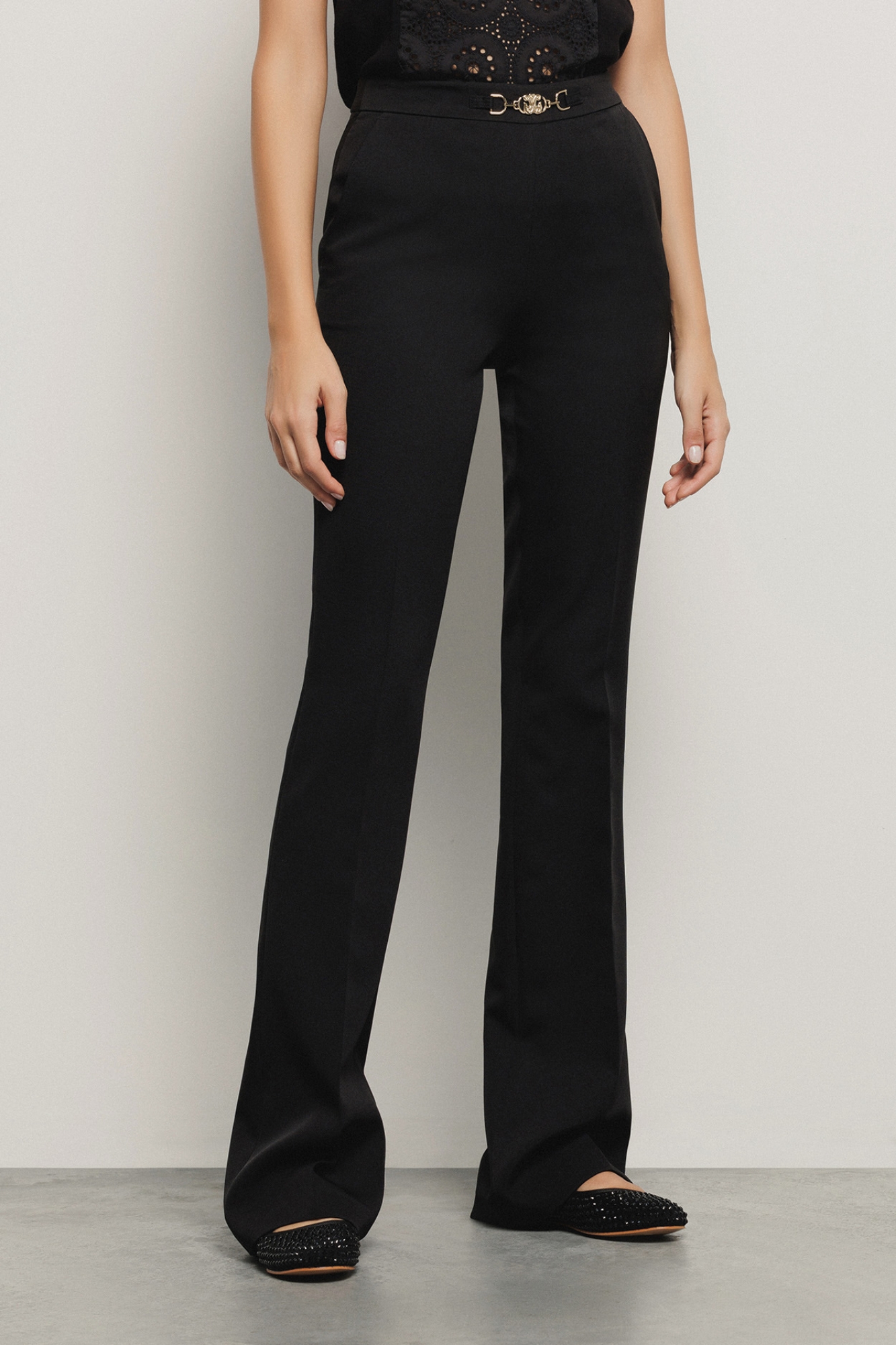 Pantalone flaire in cady con morsetti • Nero