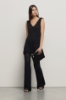 Pantalone punto mosso • Nero