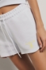 Short in felpa con elastico e stampa • Bianco