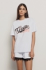 T shirt in jersey over paricollo con stampa • Bianco