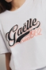 T shirt in jersey over paricollo con stampa • Bianco