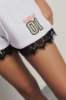 Short con balza in pizzo • Bianco