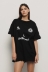 Maxi t-shirt paricollo con taglio raglan • Nero