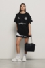 Maxi t-shirt paricollo con taglio raglan • Nero