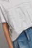 T shirt in jersey paricollo con strass • Bianco