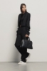 Maxi shoulder strap con logo in metallo • Nero