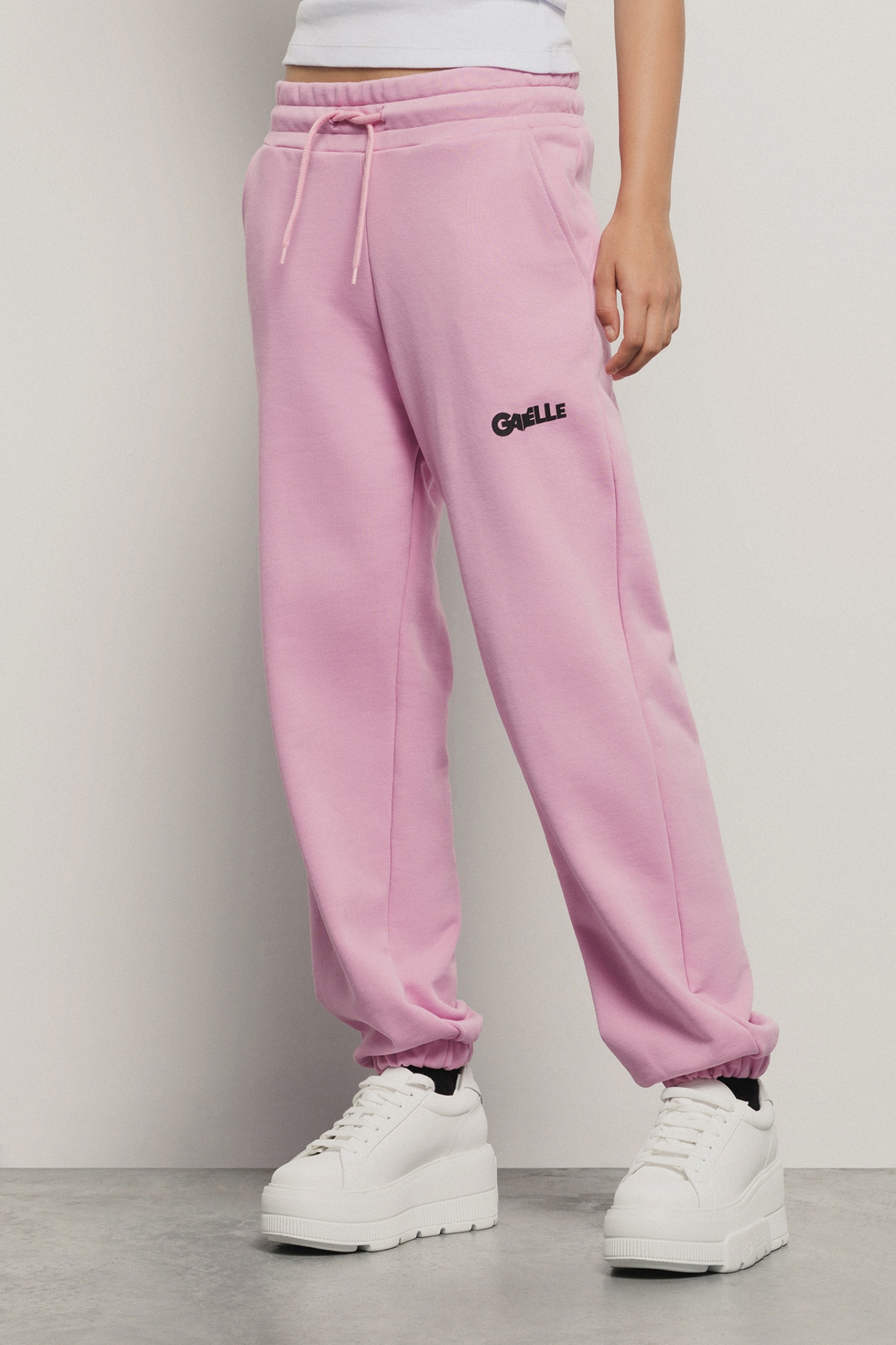 Pantalone in felpa tasche alla francese e stampa • Rosa orchidea