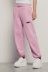 Pantalone in felpa tasche alla francese e stampa • Rosa orchidea