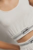 Top con elastico al fondo • Bianco