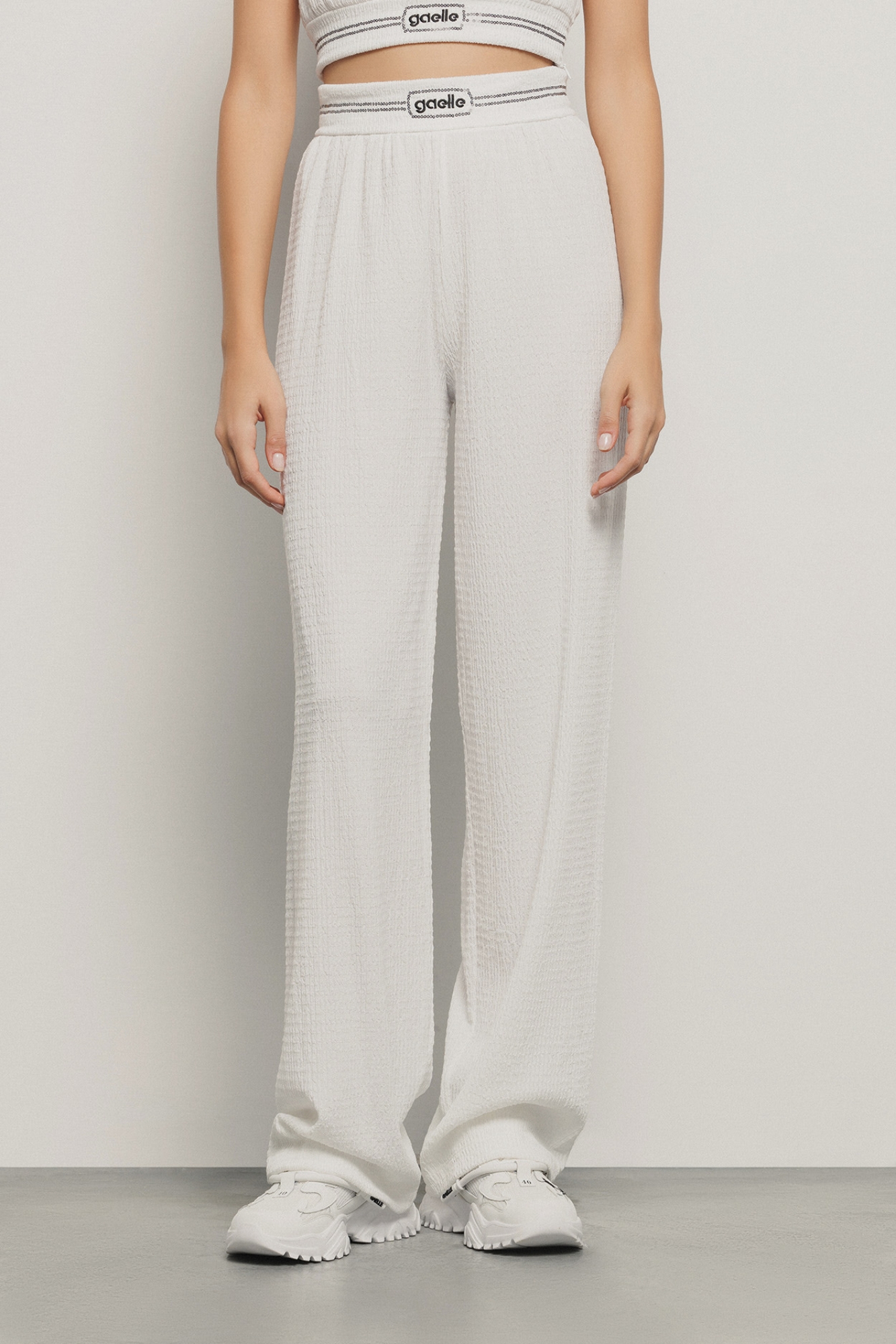 Pantalone largo con cinto logato • Bianco