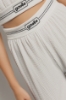 Pantalone largo con cinto logato • Bianco