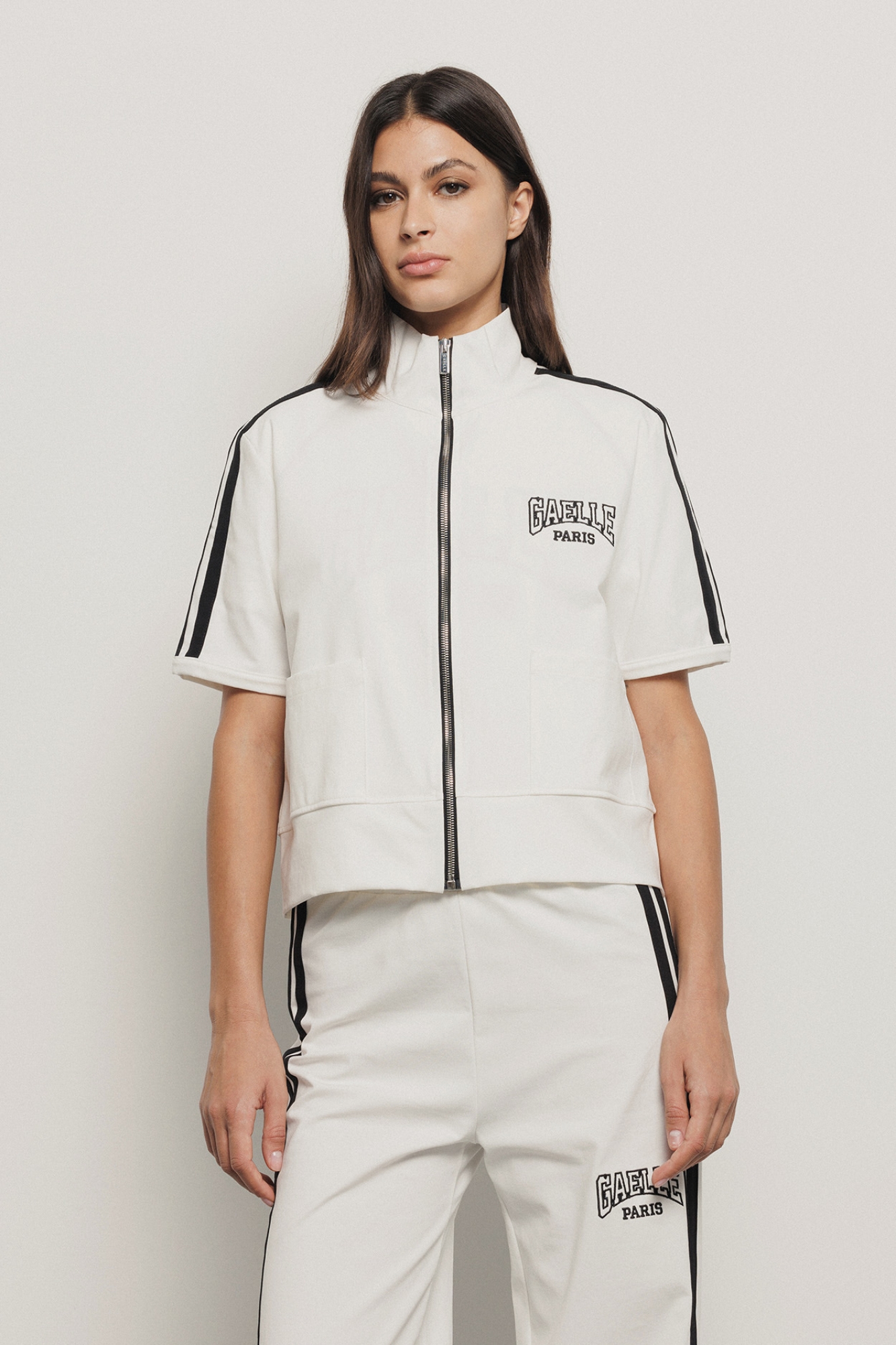 Felpa zippata collo alto • Bianco