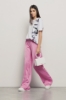T shirt jersey paricollo con maxi stampa • Bianco
