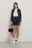 Gonna mini con fermanodo logato • Nero