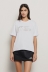 T-shirt paricollo con dettaglio apertura sul retro • Bianco
