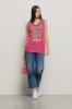 Canotta in pizzo con smanicato e ricamo • Fucsia