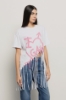 T-shirt lunga girocollo con fondo laserato a frange e stampato • Bianco