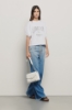T shirt smanicata con arricciature sulle spalle • Bianco