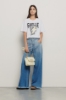 T shirt in jersey paricollo con stampa • Bianco