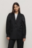 Giacca in twill monopetto con maniche a sbuffo a contrasto e polisino • Nero