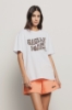 T shirt in jersey paricollo con stampa • Bianco