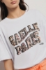 T shirt in jersey paricollo con stampa • Bianco