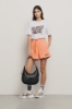 Short in felpa con cinto elastico e stampa • Arancio