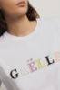 T shirt in jersey paricollo con ricamo • Bianco
